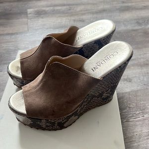 High wedge open toe mules- Cordani leather.